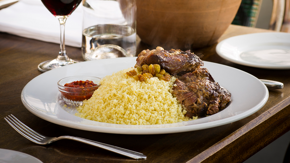 Lamb Marrakesh and a glass of red wine.