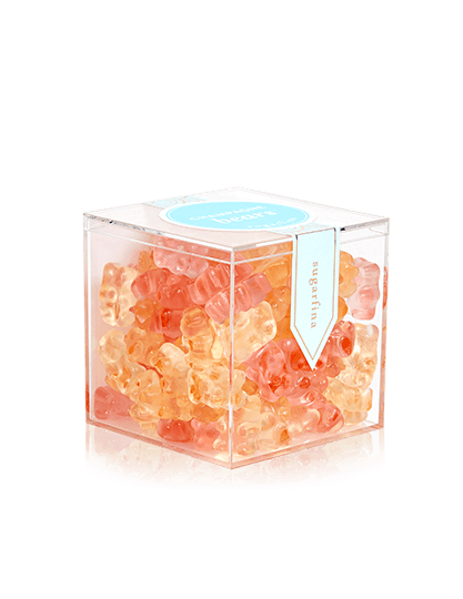 Clear box filled with gummy Champagne Bears.
