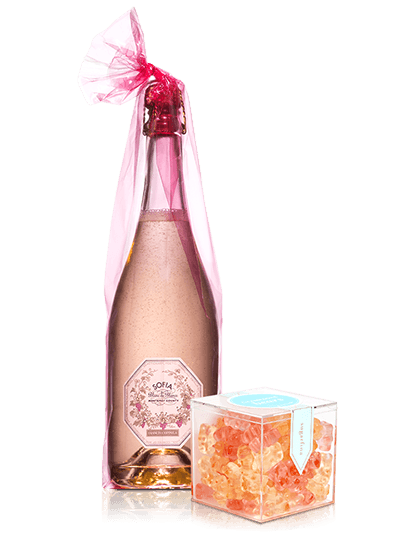 Sofia Blanc de Blancs bottle and a clear box filled with champagne gummy bears.